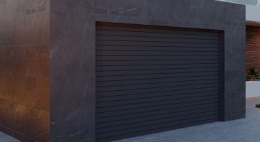 Agrandissement d'une maison avec l'ajout d'un garage au design moderne avec paravent en Pierre naturelle. Projet disponible à Saint-Louis